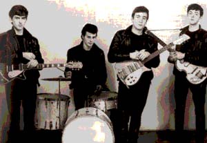 The early days of The Beatles, when they were still wearing the leather gear that made them stand out during the time they spent playing in Hamburg, Germany. This is among the first of the publicity photos ever taken of The Beatles and Pete Best (second left) was still the drummer for the band.