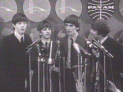 The Beatles at their first press conference at the New York City airport