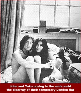 Another photo of John and Yoko from the Two Virgins era: here they pose nude amid the disarray of their temporary London flat that was sub-leased to them by John's bandmate, Ringo Starr.