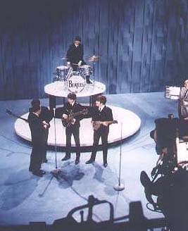 The Beatles on the Ed Sullivan Show set
