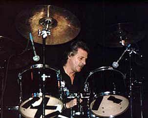 Pete Best plays drums at a fan convention in the 1990s