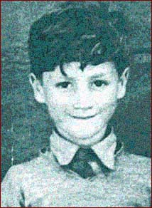 John Lennon as a young boy, while he was growing up in Liverpool, England in the 1940s.